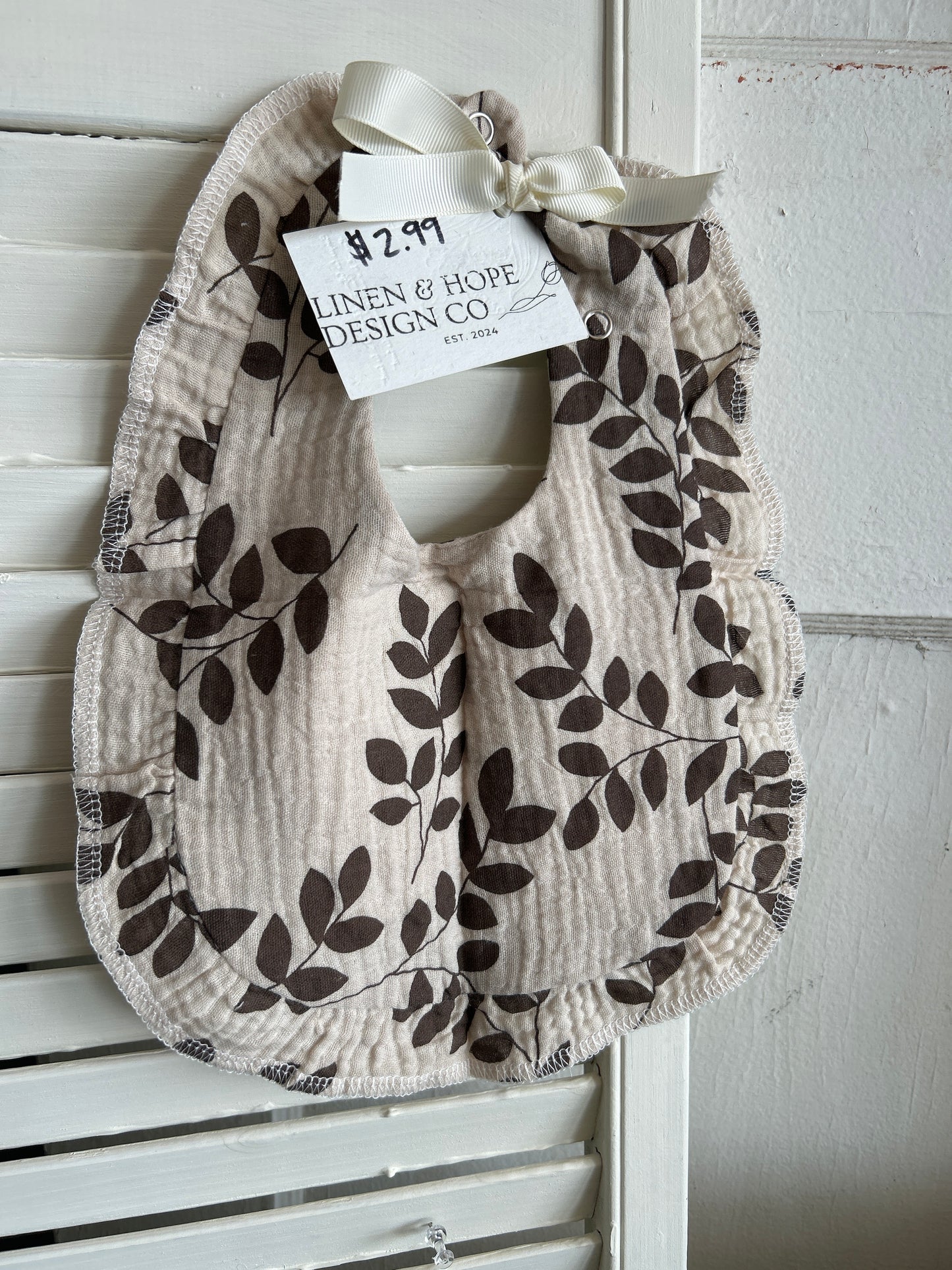 Mocha botanical bib